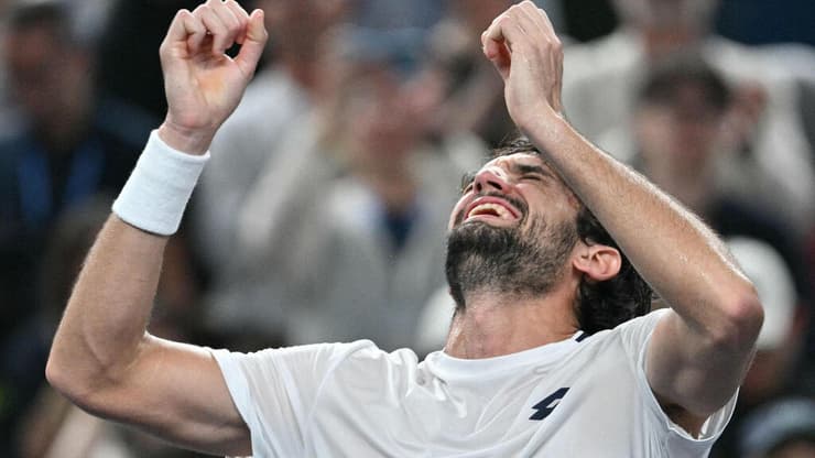 איזה מסע. ואשרו בסיום (צילום: HECTOR RETAMAL / AFP) ולנטין ואשרו