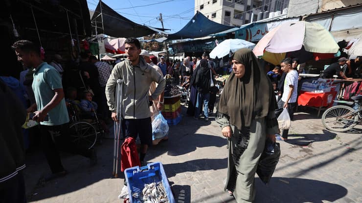השוק בנוסייראת (צילום: Eyad BABA / AFP) Eyad BABA / AFP