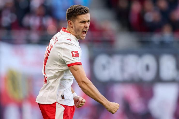 צמד מנצח. באומגרטנר (צילום: Ronny HARTMANN / AFP) כריסטוף באומגרטנר