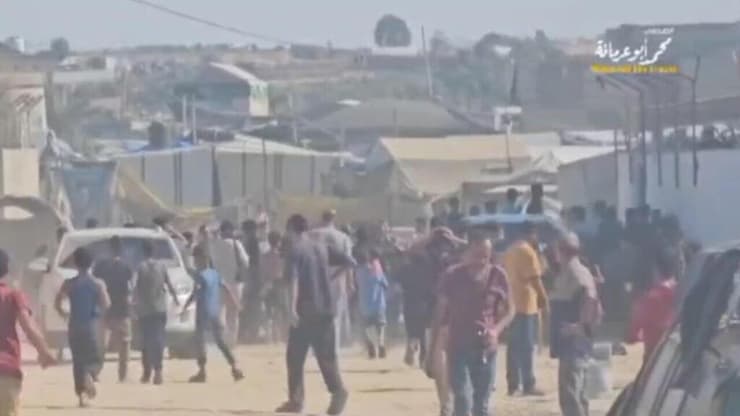 אנשי חמאס וצוותי הצלב האדום באזור רפיח הצלב האדום נפגש עם יחידת גדודי אל־קסאם ברפיח