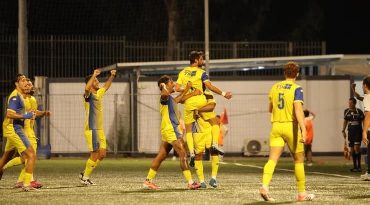 שחקני מכבי אשדוד חוגגים (יונתן גינזבורג) שחקני מכבי אשדוד חוגגים