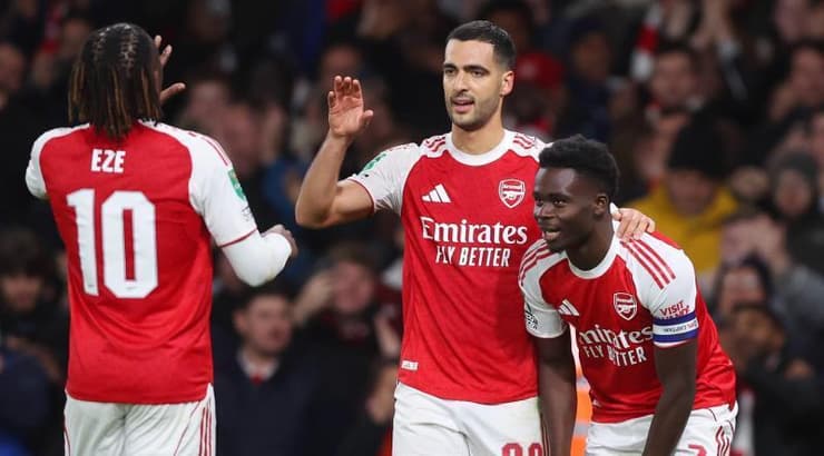 שחקני ארסנל חוגגים (IMAGO) שחקני ארסנל חוגגים