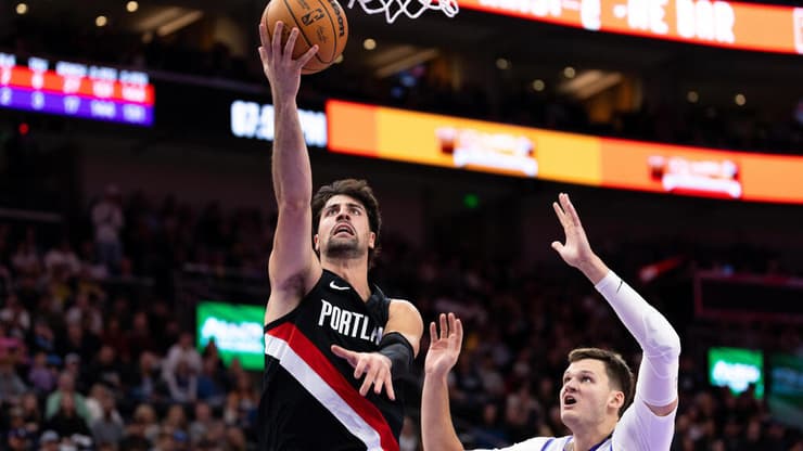 אבדיה מעל ווקר קסלר מיוטה ג'ז (צילום: AP Photo/Anna Fuder) דני אבדיה