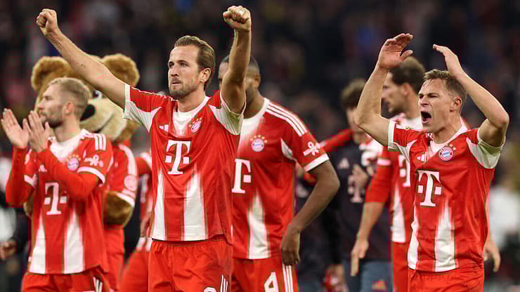 14 משחקים, 14 ניצחונות. קיין והחברים חוגגים (צילום: Alexander Hassenstein/Getty Images) קיין והחברים חוגגים