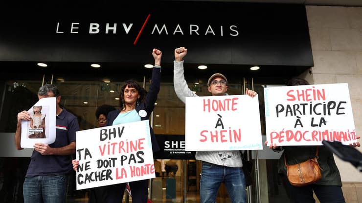 מחאה מחוץ ל-BHV Marais (צילום: REUTERS/Abdul Saboor) מחאה מחוץ ל-BHV Marais