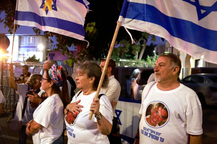 צילום: Menahem Kahana / AFP ארון החלל החטוף מגיע למכון לרפואה משפטית