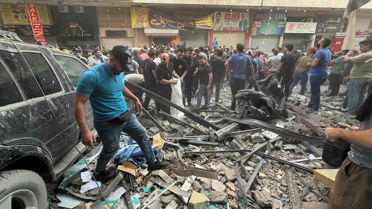 צילום: Ibrahim AMRO / AFP תקיפה בדאחייה