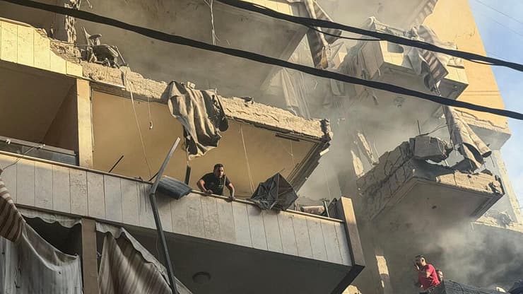 התקיפה בדאחייה (צילום: Ibrahim AMRO / AFP) תקיפה בדאחייה