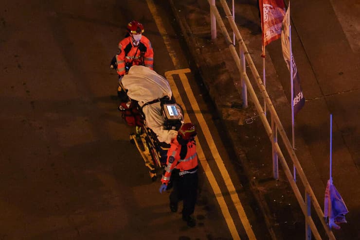 הונג קונג שריפה מתחם מגורים עשרות הרוגים