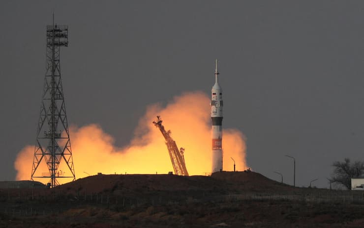 שיגור חללית סויוז לתחנת החלל (צילום: REUTERS/Pavel Mikheyev) שיגור חללית סויוז לתחנת החלל