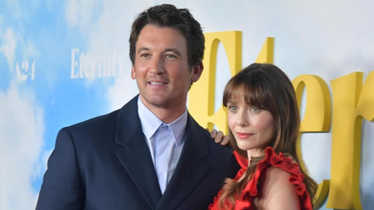 היא רוצה אמונה, הוא זורם עם שלו. אליזבת' אולסן ומיילס טלר (צילום: Richard Shotwell/Invision/AP) אליזבת' אולסן ומיילס טלר