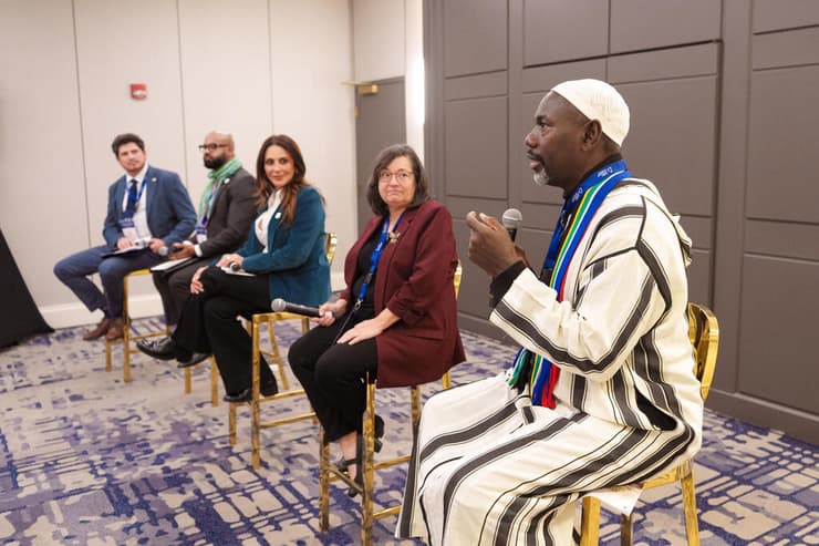 אחד הפאנלים בכנס (צילום: Paul Morse Photography) אחד הפאנלים בכנס