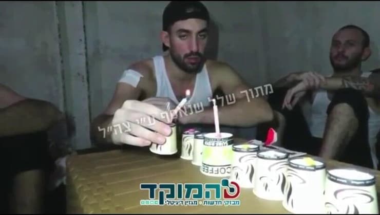 תיעוד של ששת החטופים שנרצחו במנהרות מדליקים נר חנוכה