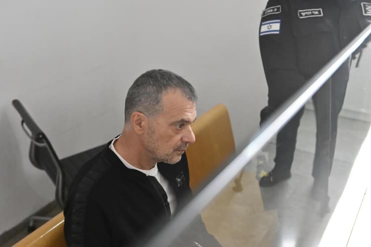 קצ'ורה בבית המשפט לפני גזר הדין (צילום: שרון צור ) דיון גזר דינו של אדוארד קצ'ורה