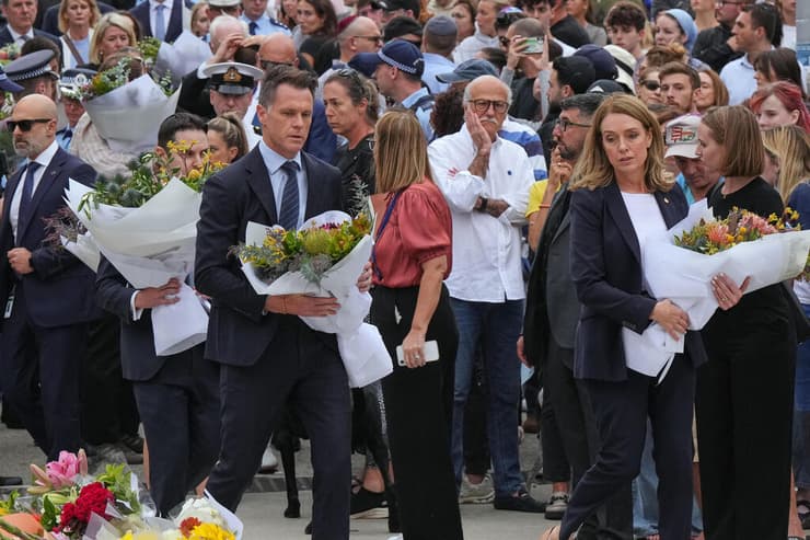 צילום: AP Photo/Mark Baker סידני חוף בונדיי יום אחרי הטבח