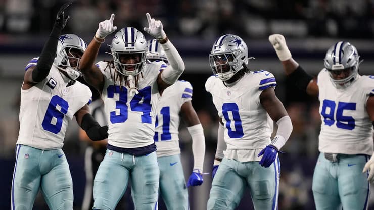 שוב בפסגה. שחקני דאלאס קאובויס חוגגים (צילום: AP Photo/Tony Gutierrez) שחקני דאלאס קאובויס חוגגים