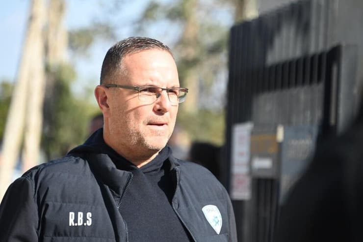 רן בן שמעון בהלוויה של אבי מלר