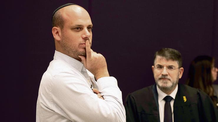 פלדשטיין בבית המשפט במהלך מעצרו