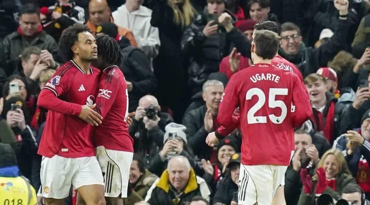 שחקני מנצ׳סטר יונייטד חוגגים (IMAGO) שחקני מנצ׳סטר יונייטד חוגגים