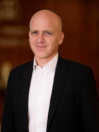 עו"ד דניאל פרידנברג