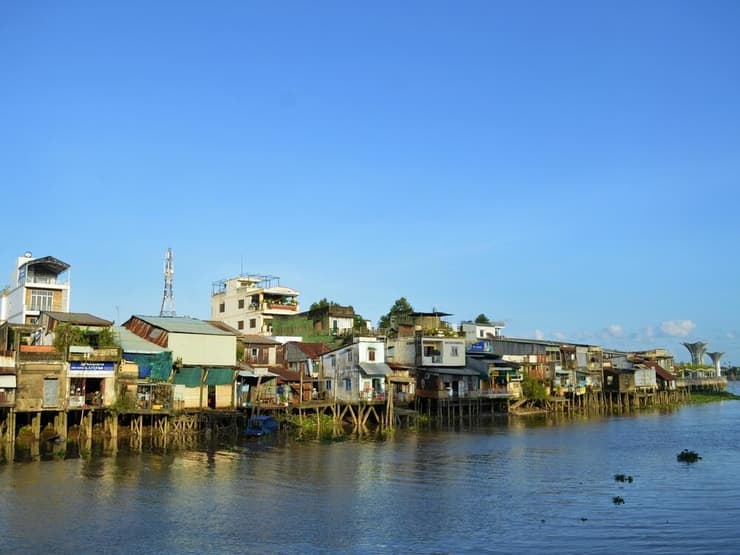 אזור מיושב על נהר המקונג בווייטנאם, שעלול להיות בסיכון בטווח הקרוב בשל שקיעת הקרקע