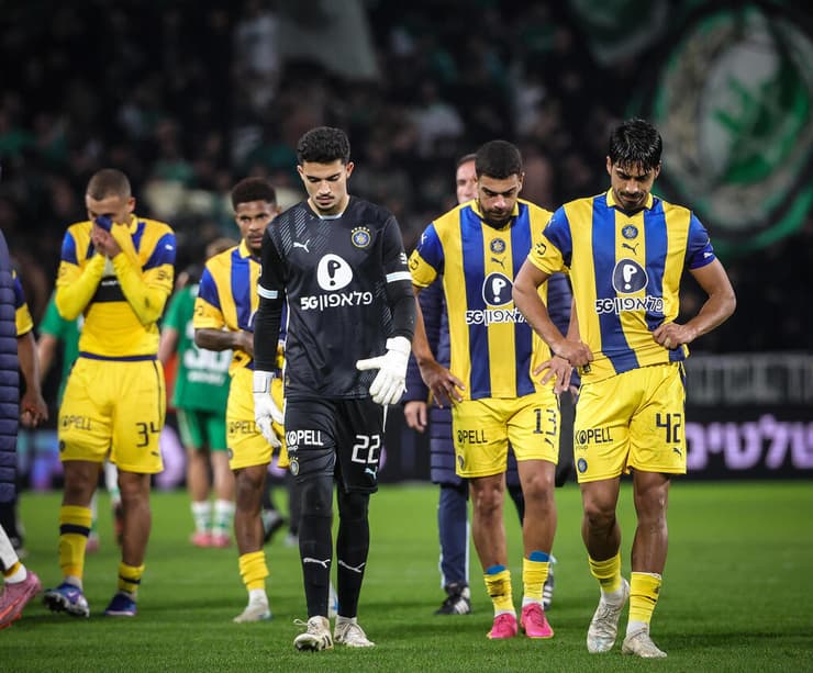 שחקני מכבי (צילום: עוז מועלם) שחקני מכבי