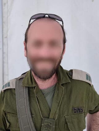 סרן (מיל') י', מפקד פלוגה ביס"ר שהוקפץ להשתתף במבצע