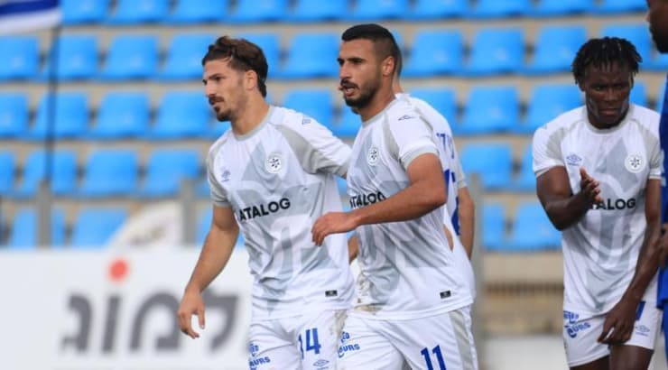 שחקני מכבי פתח תקווה חוגגים (חג'אג' רחאל) שחקני מכבי פתח תקווה חוגגים