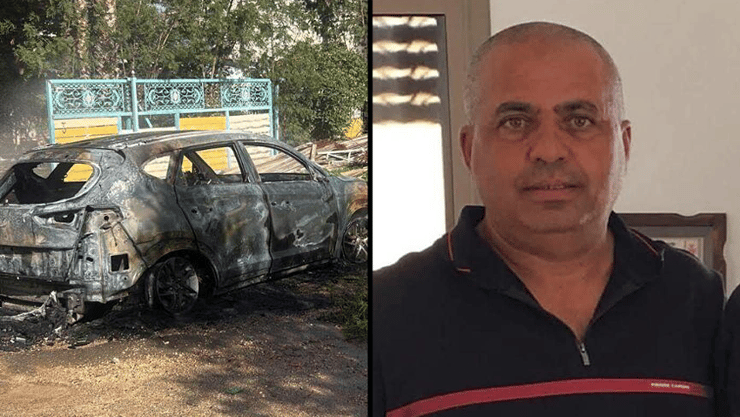 הנרצח מריסאת והרכב שהוצת סמוך לזירה (צילום: כב"ה צפון) זירת הרצח ביישוב אעבלין