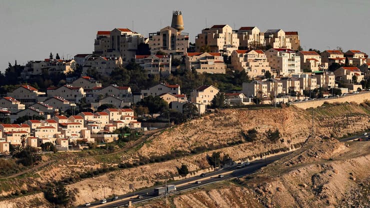 אזור E1 (צילום: AHMAD GHARABLI / AFP) מעלה אדומים