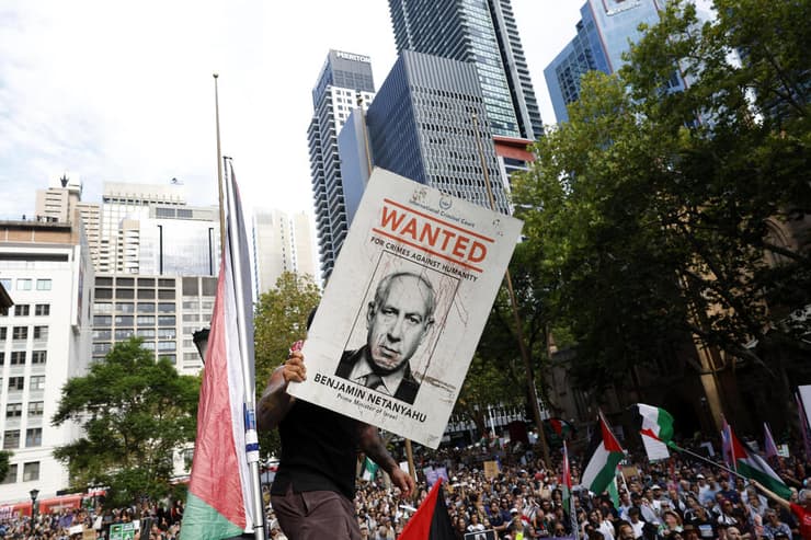 מפגינים נגד ביקור הנשיא הרצוג בסידני