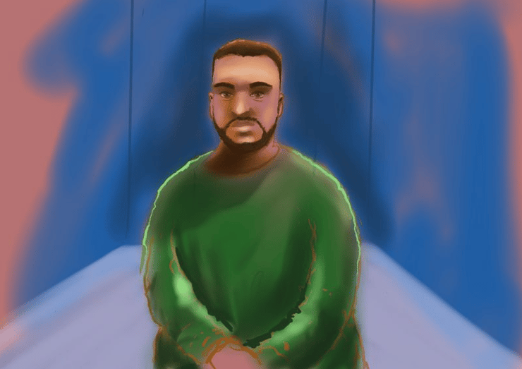 המחבל אכרם נאביד בהופעה ראשונה בבית המשפט באוסטרליה, לבוש מדי אסיר ירוקים