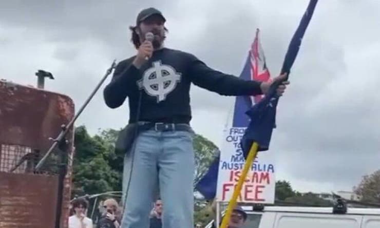 ברנדון קושל בעצרת בסידני (צילום: מתוך הרשתות החברתיות, לפי סעיף 27א') ברנדון קושל בעצרת בסידני