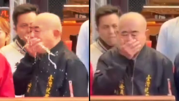 ראש המקדש לין מנסה להתאפק - ולא מצליח מישהו הקיא על נשיא טייוואן