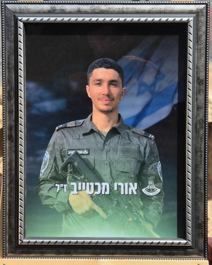 "אנציח את בני דרך הערכים שלו". תמונתו של אורי בבית (צילום: עידו ארז) רונן מכטייב