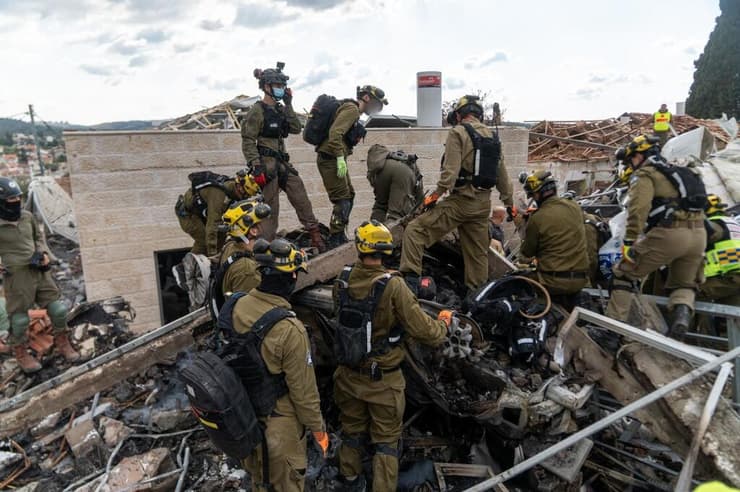 "אמרתי למפקדים: 'אתם תספרו לחיילים שלכם על בית שמש'". אנשי חטיבת החילוץ בזירת האסון, מרץ (צילום: דובר צה"ל ) פעילות כוחות פיקוד העורף בזירת הנפילה בבית שמש