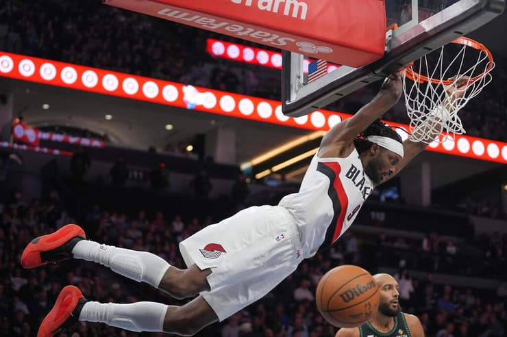 האיש של פורטלנד הלילה במאני-טיים. גרנט (צילום: AP Photo/Abbie Parr) גרנט