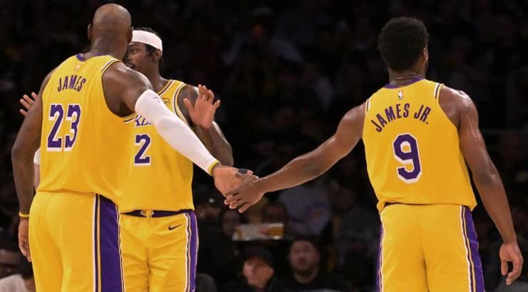 לברון וברוני ג'יימס (רויטרס) לברון וברוני ג'יימס