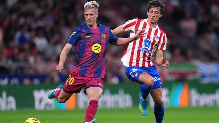 שחקן ברצלונה דני אולמו מול שחקן אתלטיקו מדריד רובין לה נורמן