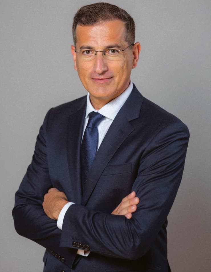 עו"ד וד"ר מנשה כהן