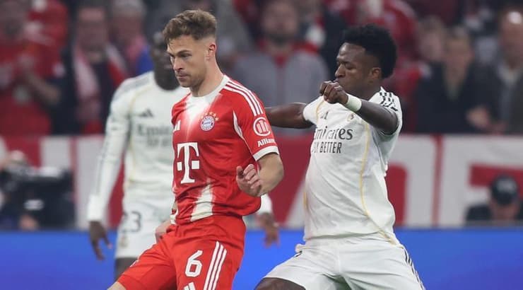 ג'ושוע קימיך מול ויניסיוס (IMAGO) ג'ושוע קימיך מול ויניסיוס