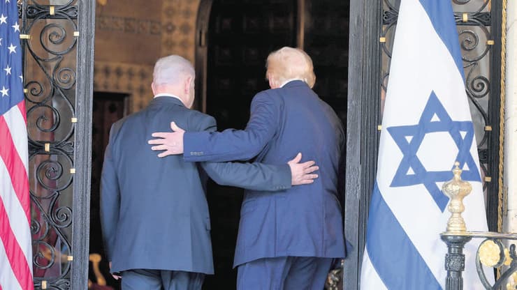 טראמפ רואה בהסכם הישג - ומוכן לרסן את ישראל (צילום: עמוס בן גרשום, לע"מ) דונלד טראמפ ובנימין נתניהו בפלורידה