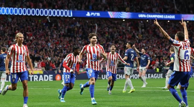 שחקני אתלטיקו מדריד חוגגים את השוויון