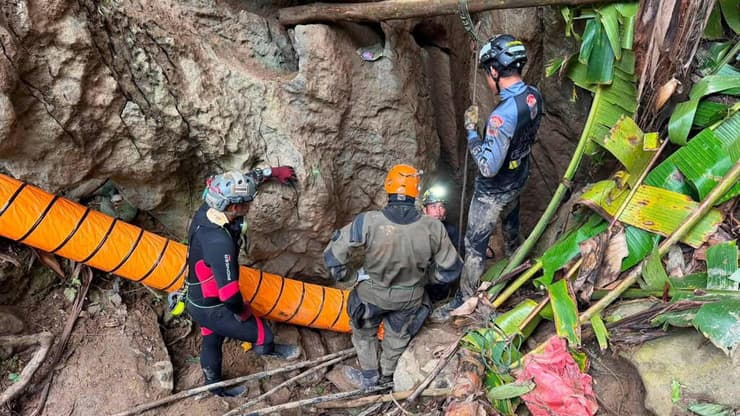 צילום: Metta Tham Kalasin Rescue/Handout via REUTERS מאמצי החילוץ ממנהרה בלאוס
