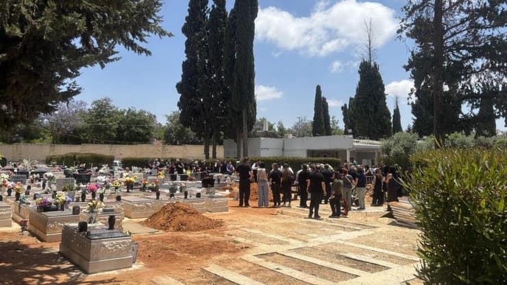 בני הזוג רוסלן ואולגה פריחודקו מובאים למנוחות