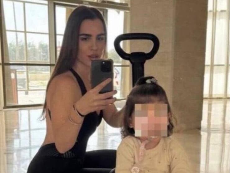 ליה עם בתה הפעוטה (צילום: סעיף 27א לפי חוק זכויות יוצרים) ליה כהן מלכה שנרצחה בפיצוץ הרכב באיילון