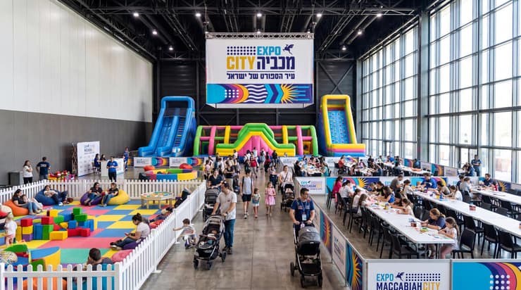 מתחם קטנטנים וחנות ספורט במכביה סיטי (באדיבות באזמרקט) מתחם קטנטנים וחנות ספורט במכביה סיטי