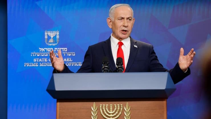 רה"מ בנימין נתניהו בהצהרה לתקשורת לאחר חתימת ההסכם בין ארה"ב לאיראן (צילום: אוליבייה פיטוסי, הארץ ) רה"מ בנימין נתניהו בהצהרה לתקשורת לאחר חתימת ההסכם בין ארה"ב לאיראן