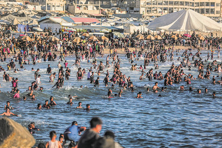חוף הים בעזה (צילום: Faiz Qreqa/AFP) חוף הים בעזה
