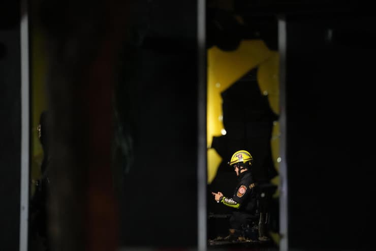 צילום: AP Photo/Sakchai Lalit תאילנד שריפה ב פאב ב בנגקוק